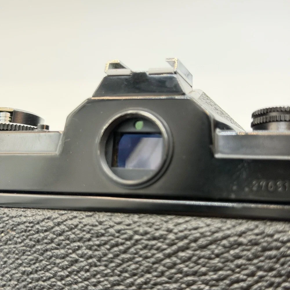 Chinon CX 35mm SLR Film Camera with Auto Chinon 55mm f1.7 Lens Black Japan